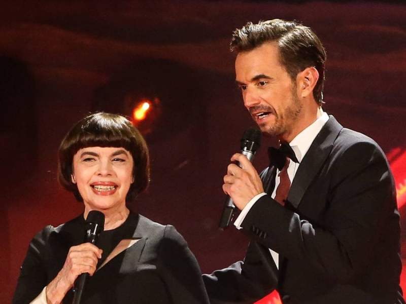 Mireille Mathieu und Florian Silbereisen 2018 bei einer Liveshow der ARD. © imago images/Christian Schroedter