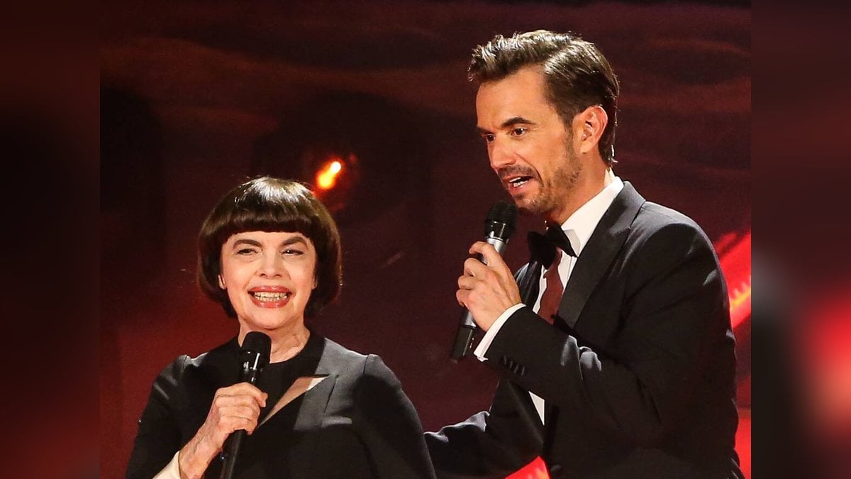 Mireille Mathieu und Florian Silbereisen 2018 bei einer Liveshow der ARD. © imago images/Christian Schroedter