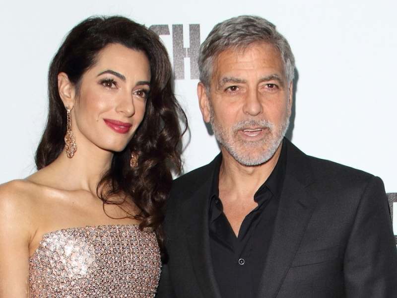 George und Amal Clooney bei einem gemeinsamen Auftritt in London.. © Landmark Media. pictures@lmkmedia.com. Tel:00 44 20 7033 3830/ImageCollect