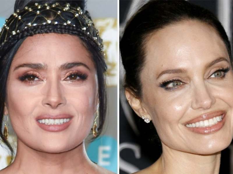 Salma Hayek (li.) versteht sich blendend mit Angelina Jolie.. © Featureflash Photo Agency/Shutterstock.com / Tinseltown/Shutterstock.com