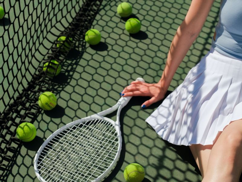 Frau beim Tennis